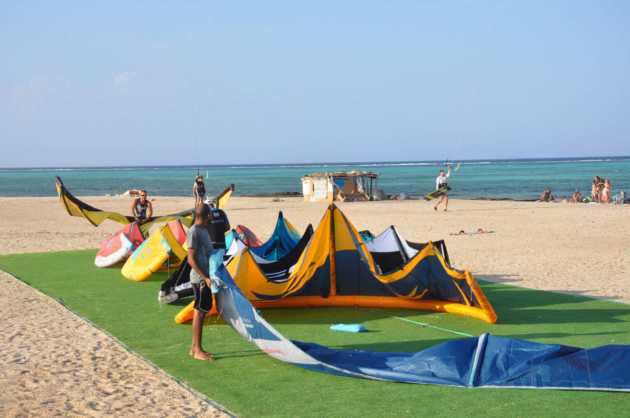 Kites and equipment on the beach beside the Marsa Alam lagoon
