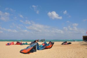 Wide sandy beach beside the turquoise sea